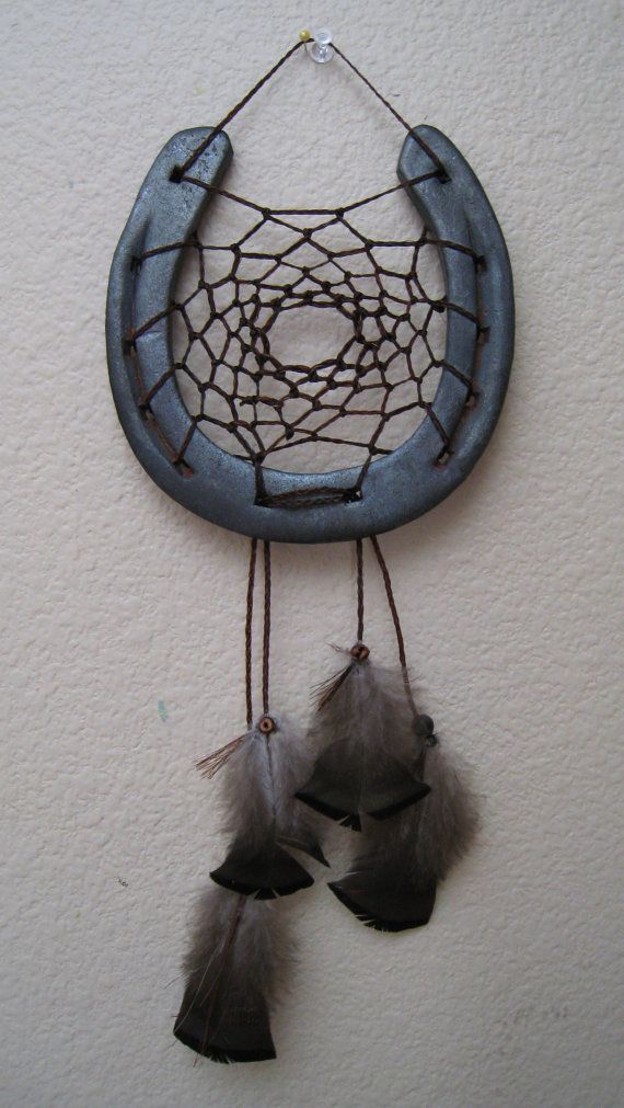 Horse shoe dream catcher for sale! I think this would be fairly easy to DIY. I k