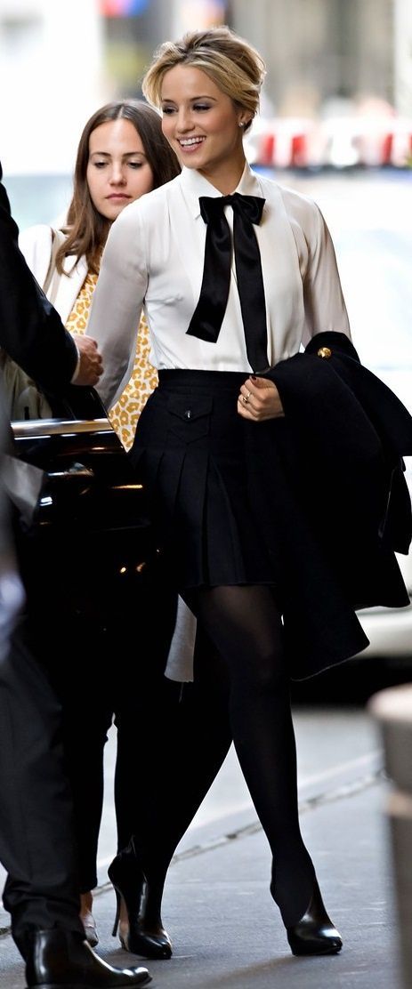 Instead of the same old black pants for your work day, do a black skirt, black l