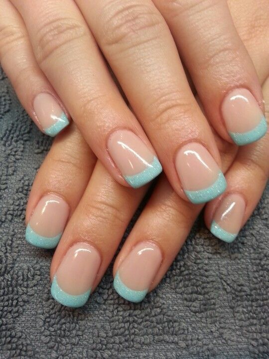 Nude and teal French manicure