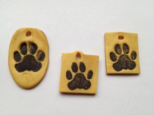 Paw stamp polymer clay pendant