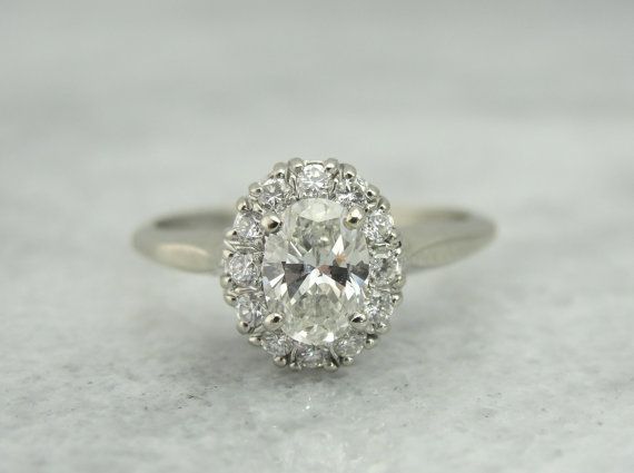 Classic Halo Engagement Ring with Oval Cut Center Diamond RGDI1102N