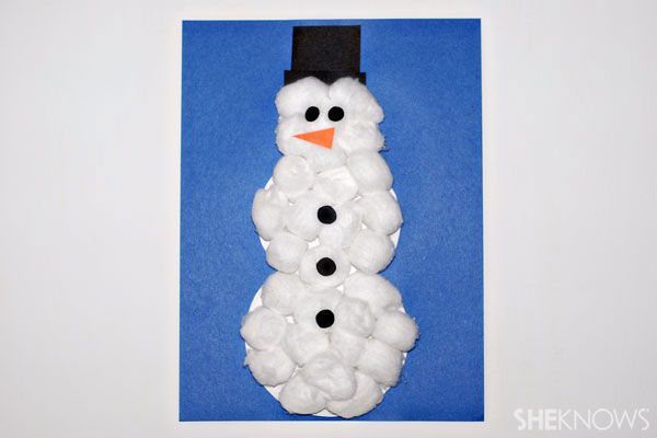 Cotton ball snowman – now thats fun and easy for little hands to make!