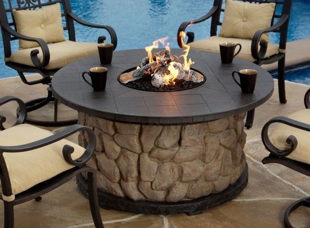 Love this gas fire pit for summer nights on our patio