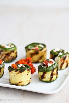 Soft goat cheese, roasted peppers and capers are rolled inside of grilled and te