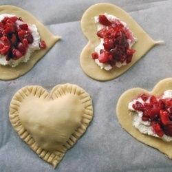 Cute for Valentines Day…. Strawberries, sugar, cream cheese, and pie dough!