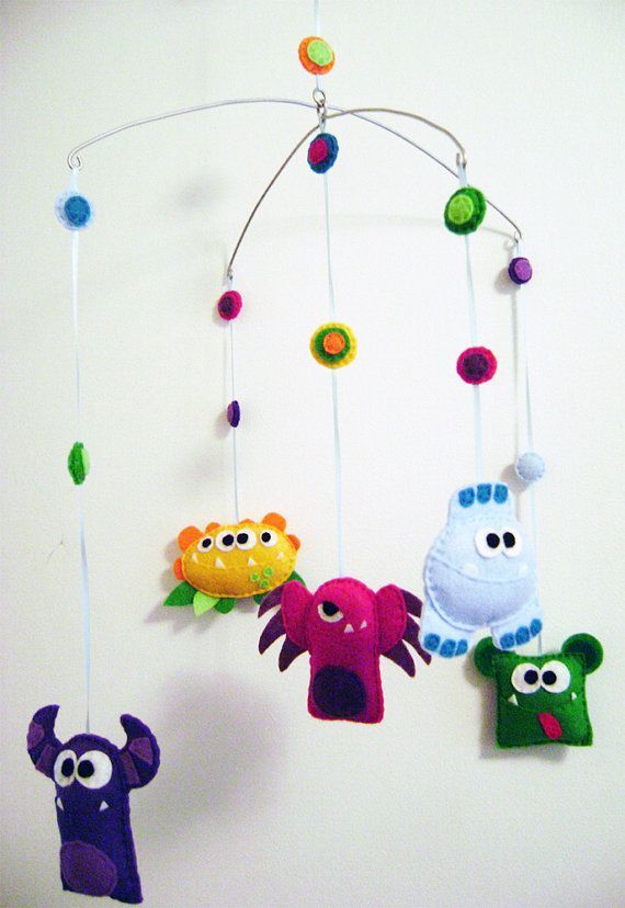 if this baby is a boy i might have to  make one of these! (monster baby mobile)