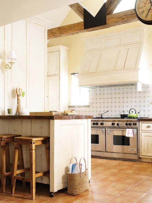love the wood (butcher block?) counters in this kitchen.