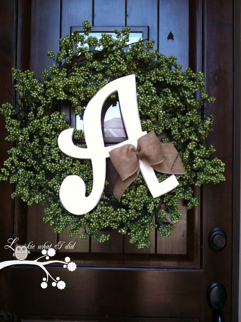 Personalize your front door with a wreath. I would love to put a green summer wr