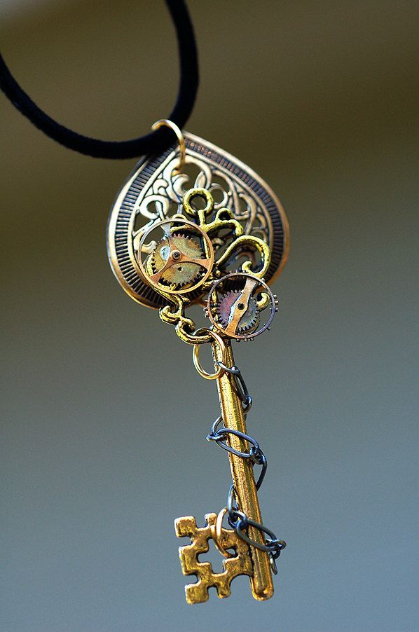 This would look cool as part of a tattoo– Golden Celtic Heart Gears Key Necklac
