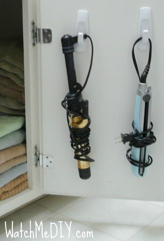 bathroom organization – DIY – hang your hairdryer + curling iron to save space.
