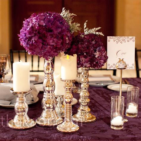 Candle and Floral Centerpieces    Groupings of candlesticks topped with pillar c