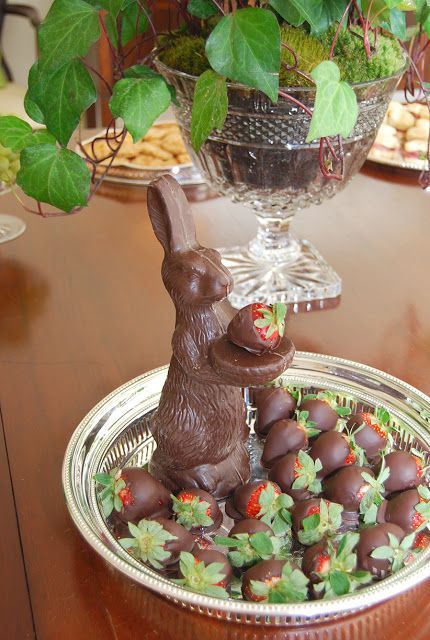 For Easter – a chocolate bunny and chocolate covered strawberries on a silver pl