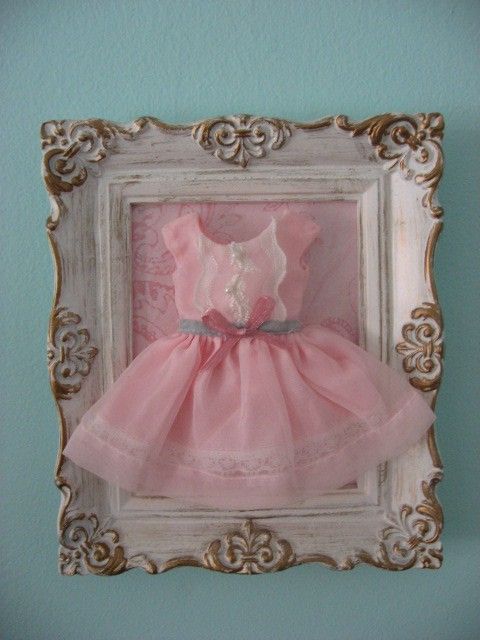 Girl bedroom wall frame. Use her old infant dress to frame when shes a little gi