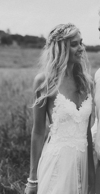 Gorgeous boho/hippie bride with braids, long blond hair, and scalloped white wed