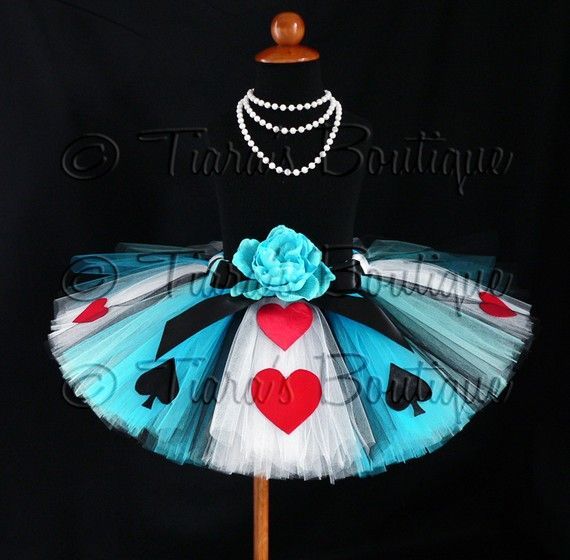 I’d love to make this alice in wonderland no sew tutu.  Loop tie tulle strips to