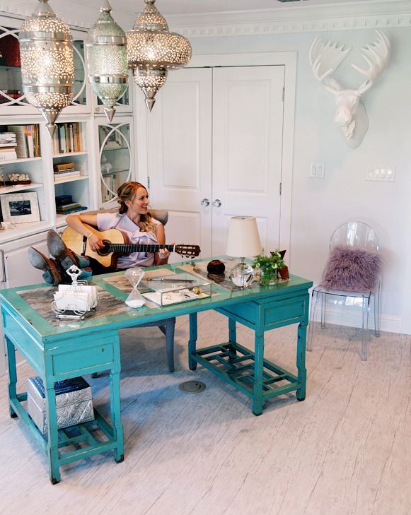 jewels office – love the turquoise desk, furry pillow, and morroccan lanterns