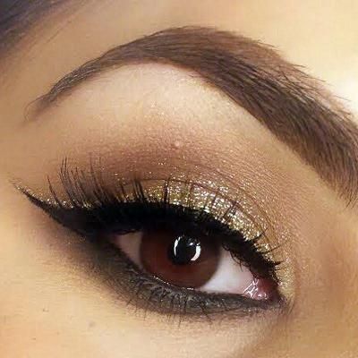 Natural eyeshadow paired w/black winged & gold glitter eyeliner- must try!