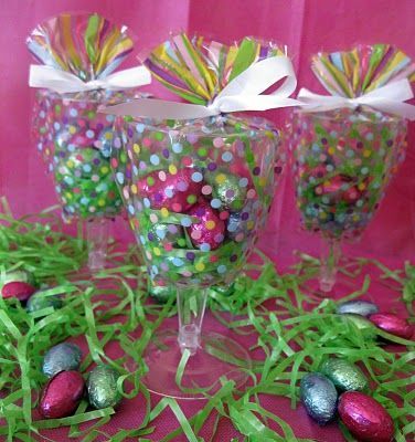 party favors – clear plastic cups inside cello bags and tied with ribbons.  :)