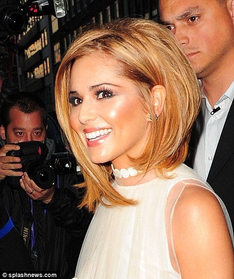 Flying solo: Cheryl Cole, seen here at her birthday party last month, has vowed