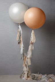 love the tassles that “dress up” the wedding balloon strings…@Lin Beaty