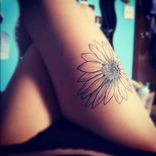 Probably my favorite of the sunflower tattoos I have seen. Totally getting one o