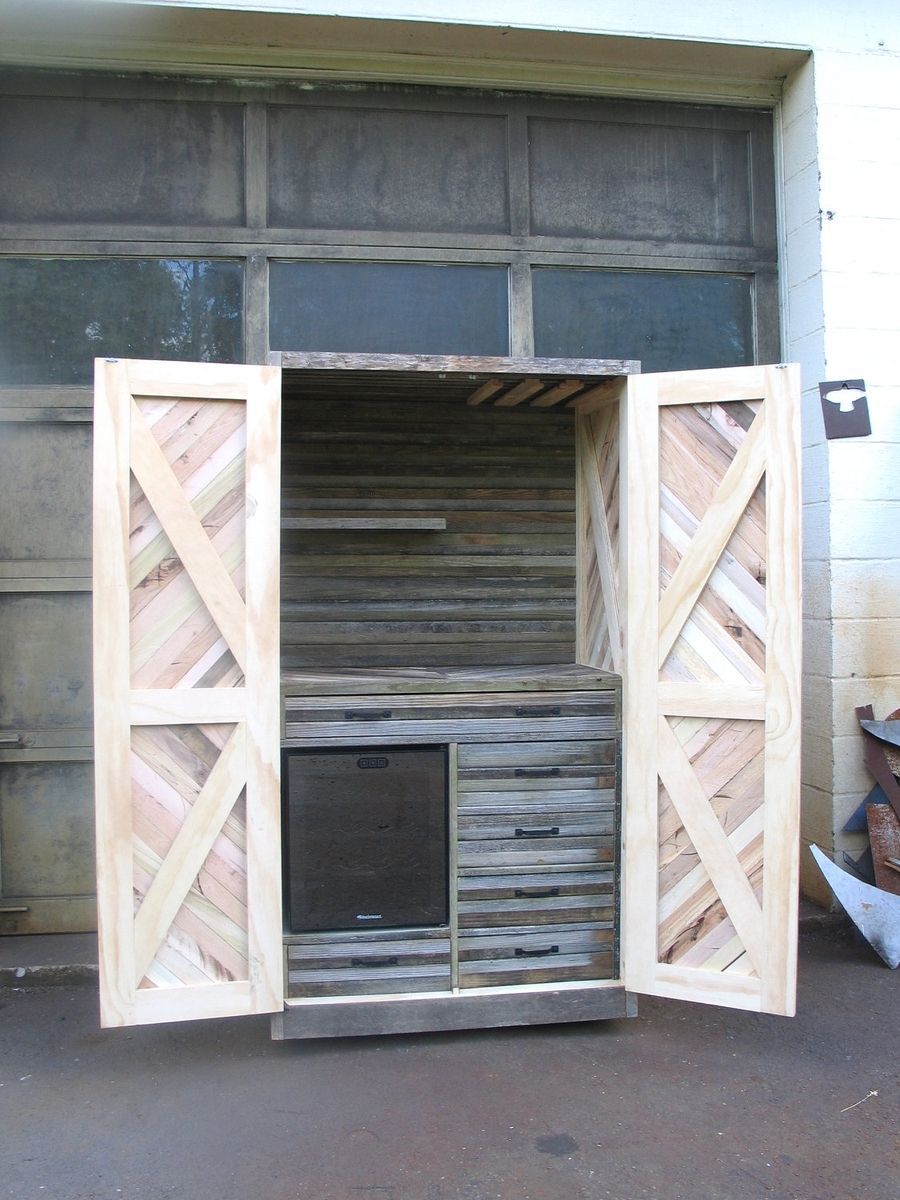 Reclaimed, pallet and barn wood, chevron liquor cabinet with a built-in wine fri
