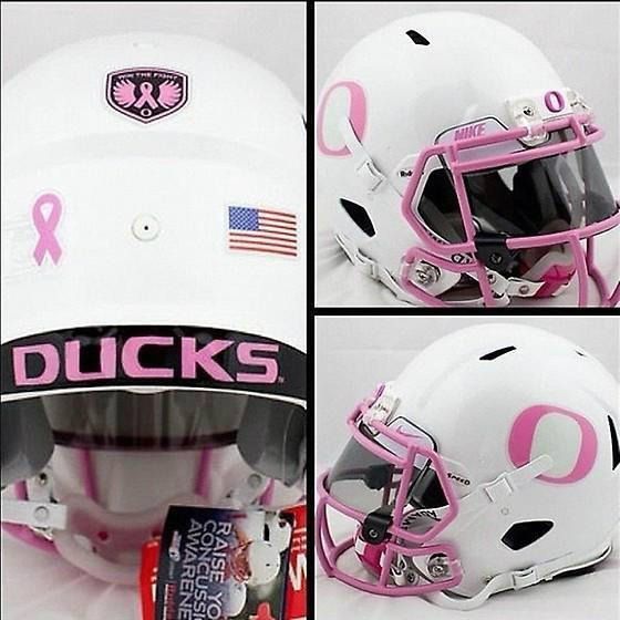 University of Oregons football helmets for breast cancer awareness month