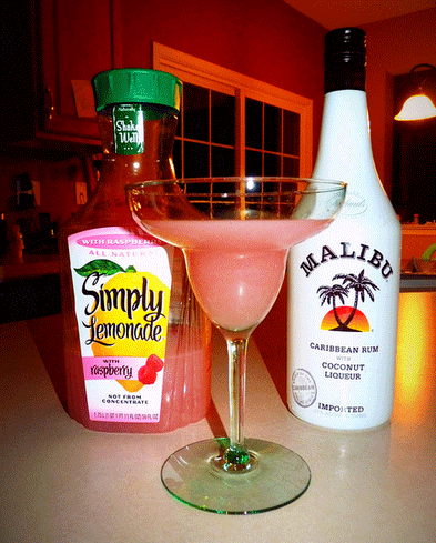 Simply Lemonade with Raspberry and Malibu Coconut Rum….I added fresh berries,