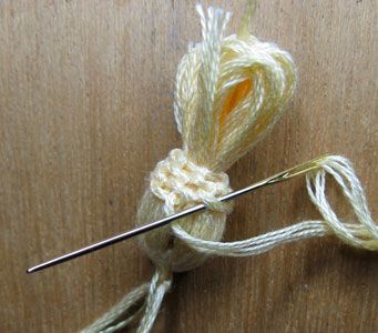 Tutorial showing how to do buttonhole stitches to cover the top of a handmade ta