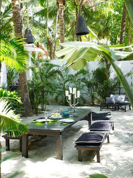 Garden – A tropical outdoor dining space on the sand with hanging lanterns. @Lon