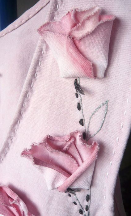 How to make raw-edged flower ornamentation for clothing.