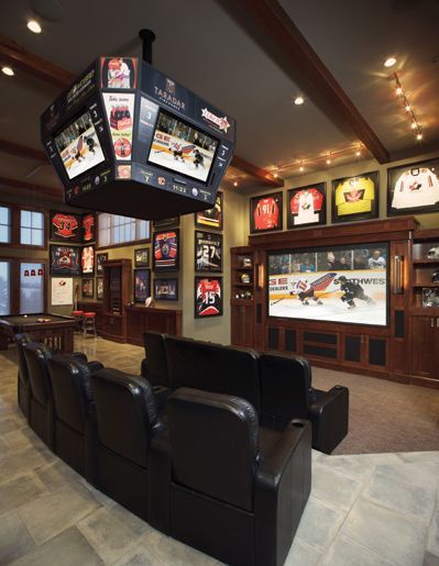Sports Home Theatre  Add a door between the kitchen and movie room and A can put