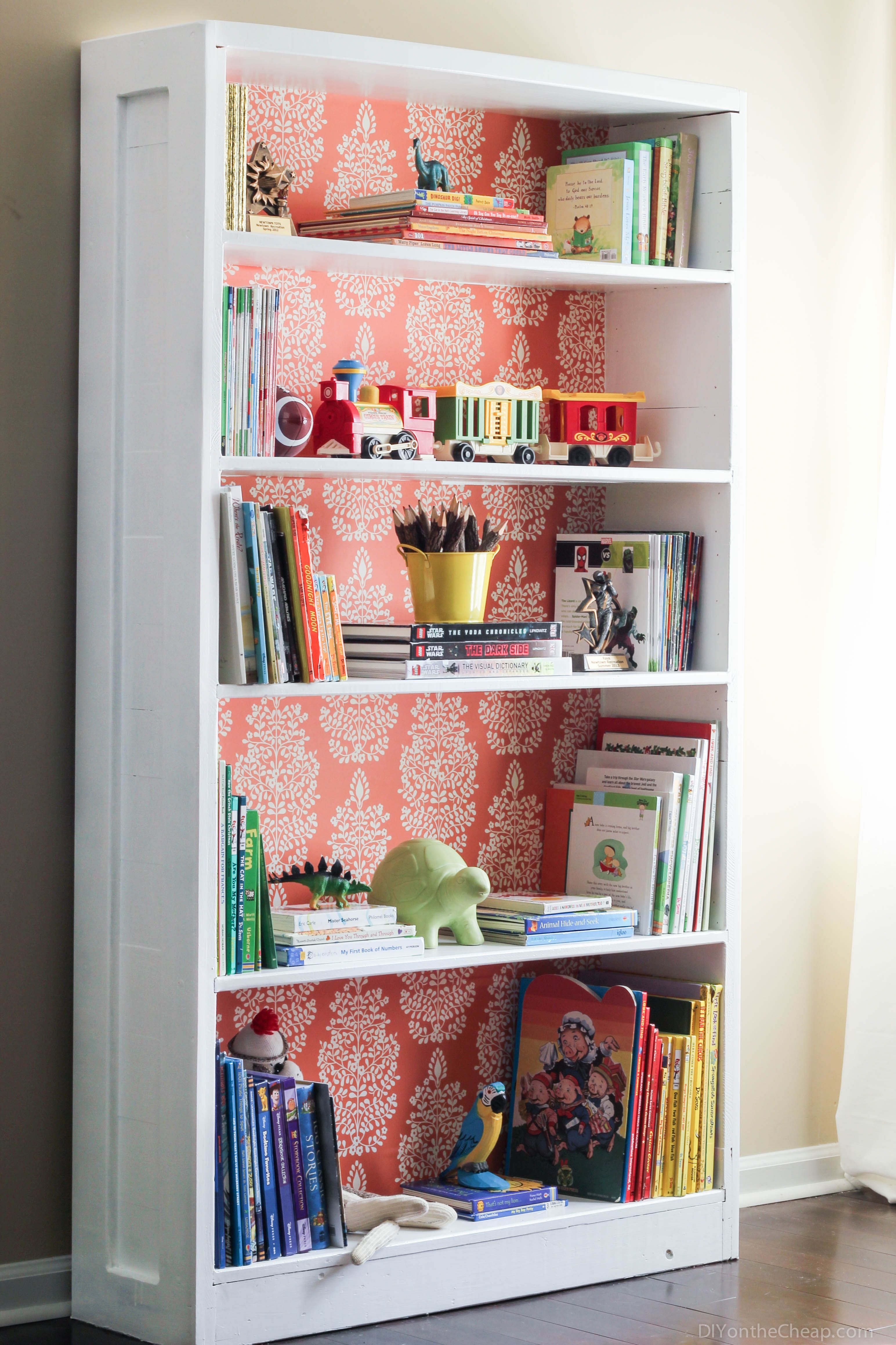 Awesome (and easy!) bookshelf makeover using paint and removable