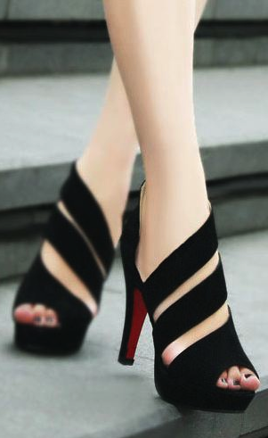 black straps high heel sand