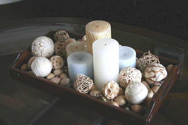 Perfect for a dining table centerpiece, inside or out.  Love the casual, impromptu feel of it, and the pale blue candles are a nice