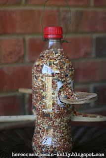 recycled bottle birdfeeder with 2 wooden