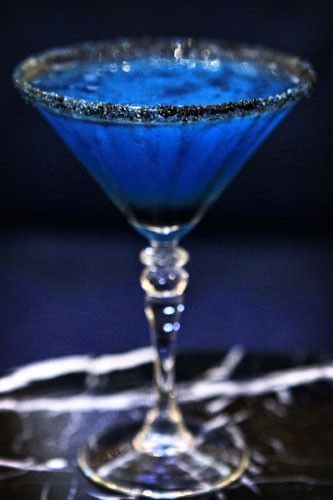 Witches Brew | Bacardi Dragon berry rum, Blue Curacao, Creme de banana, Fresh squeezed lime juice. Mix ingredients and serve up in a martini glass rimmed with black