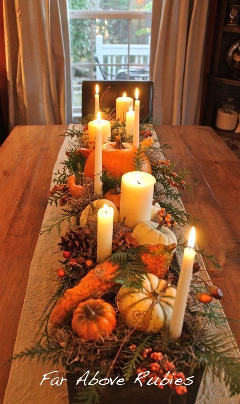 Build a long wood box, stain and add spanish moss, pumpkins, pinecones, candles, etc.. This is beautiful from Far Above Rubies: Thanksgiving