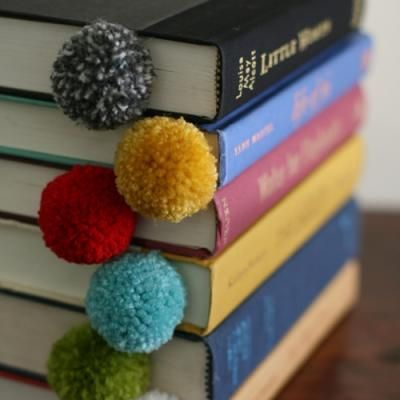 How cute are these book marks for Christmas Party Favors. Do in red or green pompom and put in a book of carols or a copy of Miracle on 34th.