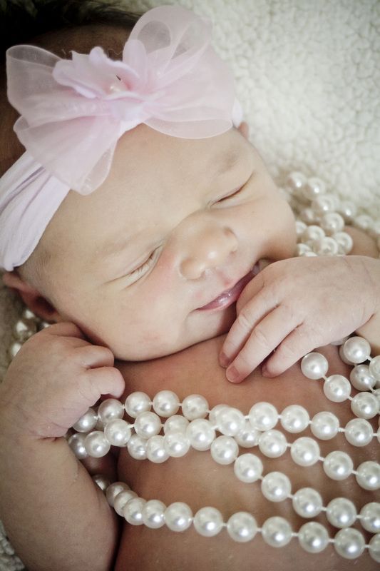 Newborn baby girl photo with pearls! So