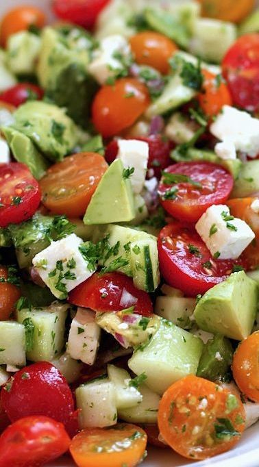 This Tomato, Cucumber  Avocado Salad is making my mouth water!! It looks so  yumma-licious!