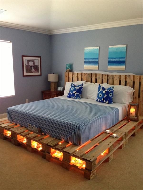 15 Unique DIY Wooden Pallet Bed Ideas | DIY and Crafts I like this diy bed made with pallets and string lights in the cubbie holes