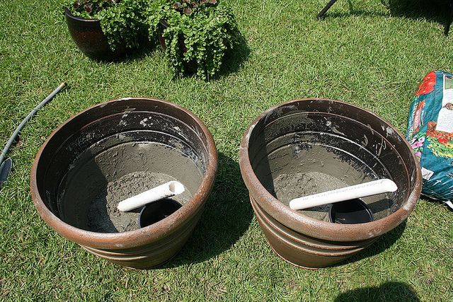 cement pvc into pots as base for sun shade