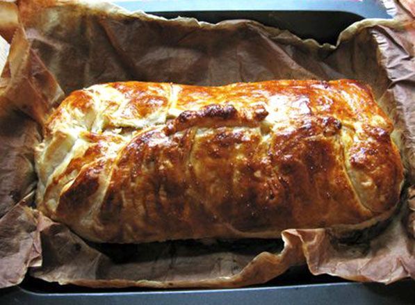 The Best Pork Tenderloin Recipe Ever! The Tenderloin is placed on  puff pasty covered with sauted onions & garlic, mustard of choice, cheese & ham . Then it is enclosed in the puff pastry. The