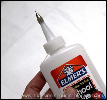 Elmers School Glue with fine tip as in Sharon Schamber’s videos that show her method for binding quilts with glue. This tips set