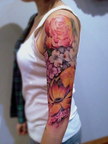 half sleeve watercolor tattoo of different flowers – upper arm, peony