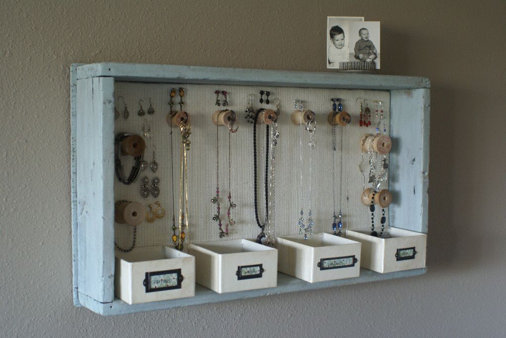 jewelry organizer from a serving tray and little boxes. I think I like this idea of having little boxes for rings/earrings instead