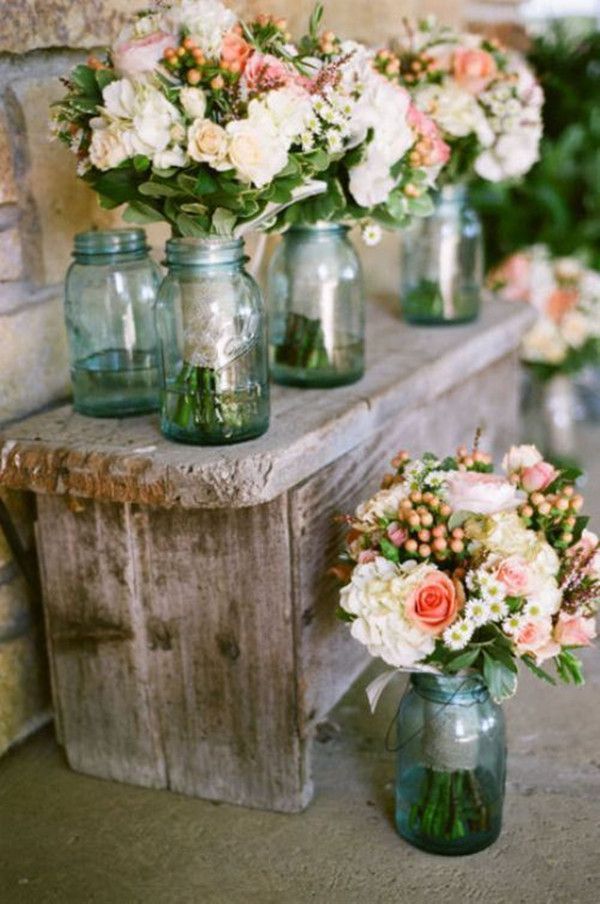 rustic wedding decoration ideas with flowers and mason jars… have to ask Jennifer what she thinks about these