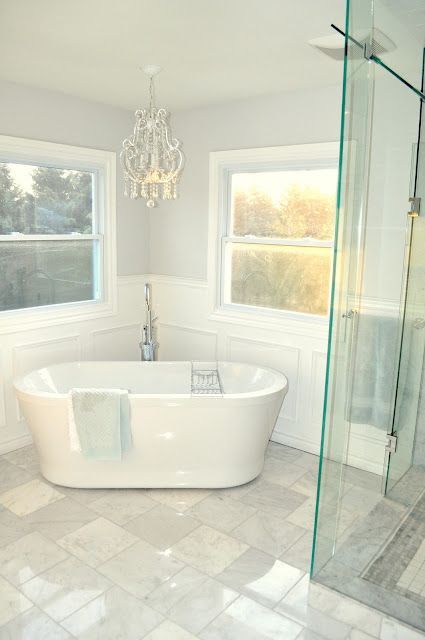 They took a builder bathroom and made it beautiful!    Source: Living Beautifully