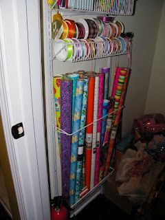 wrapping paper storage – Just got this rack at Target for $35 today! Hung it over the door until I find a permanent placement! No